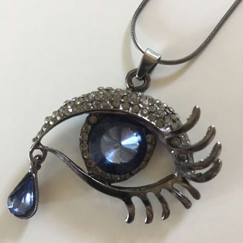 Unique crying eye necklace